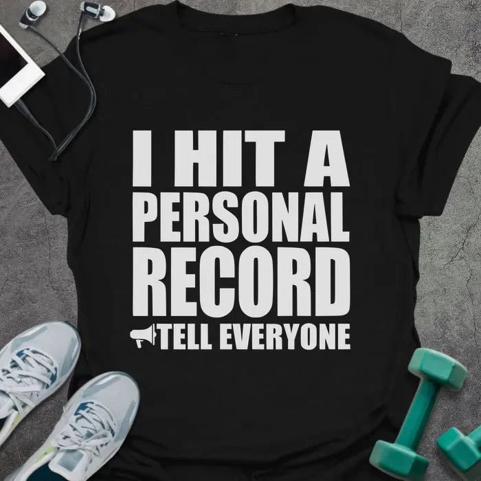 Black t-shirt printed with "I Hit a Personal Record Tell Everyone" in white, with megaphone graphic
