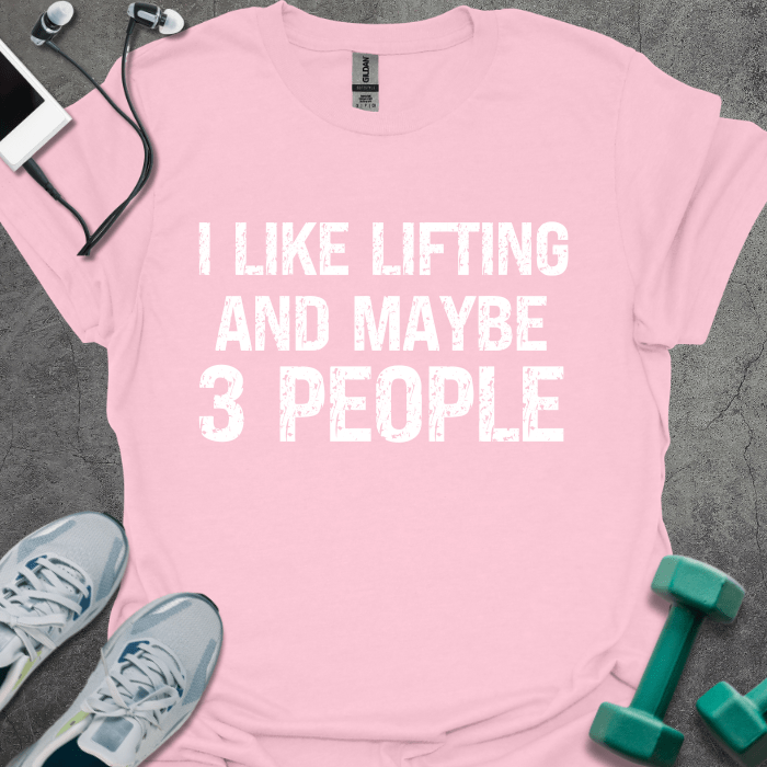 Light pink t-shirt printed with "I Like Lifting and Maybe 3 People"