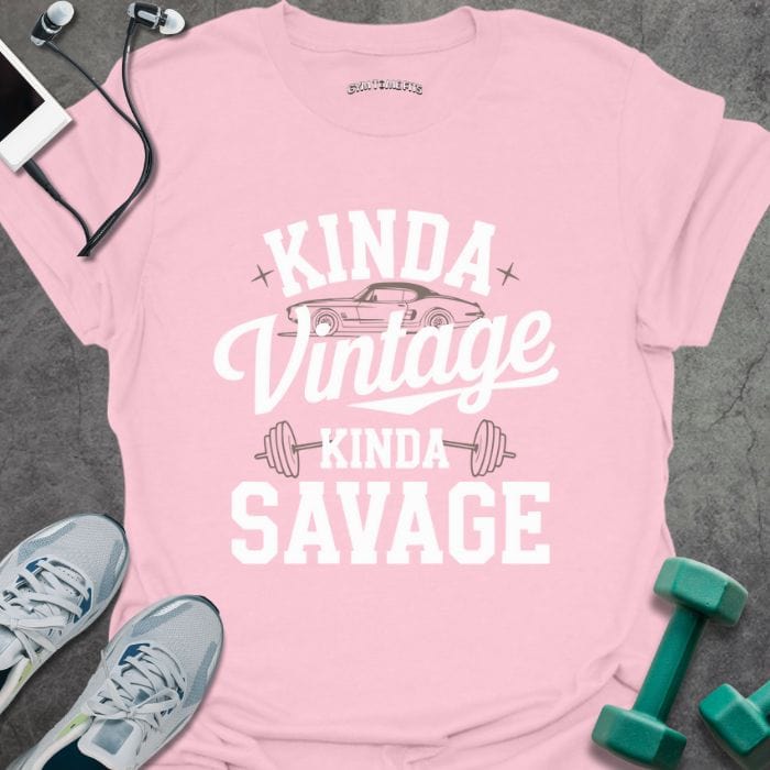Light pink t-shirt printed with "Kinda Vintage Kinda Savage", with a kettlebell graphic