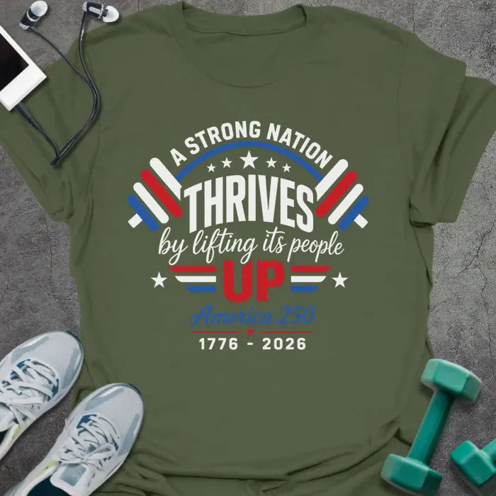 Military green t-shirt printed with "A STRONG NATION THRIVES by lifting its people UP" in red and white, with barbells and stars in American flag style