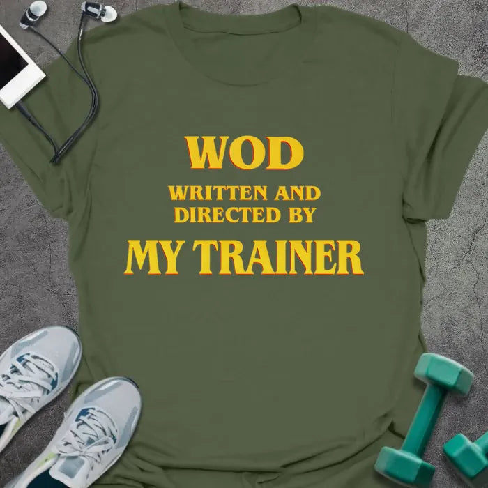 Military green t-shirt printed with "WOD Written and Directed By my Trainer" in gold