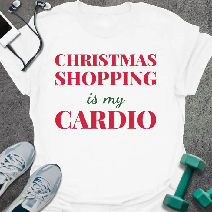 White t-shirt printed with "CHRISTMAS SHOPPING is my CARDIO" in red and green
