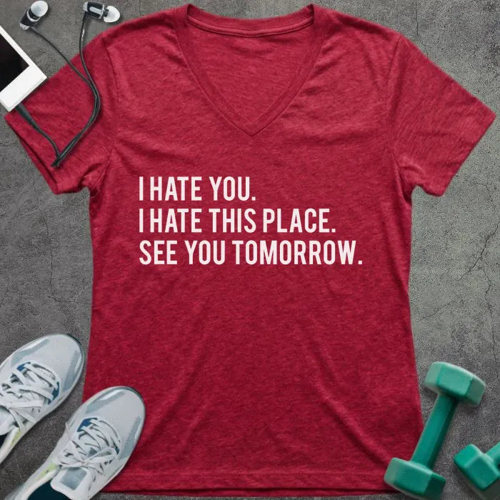 Red v-neck reading "I HATE YOU, I HATE THIS PLACE, SEE YOU TOMORROW" in white