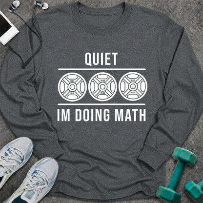 Dark heather long sleeve tee printed with "Quiet I'm Doing Math" in white, with three weight plates