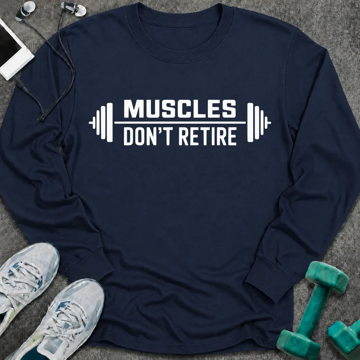 Navy long sleeve tee printed with "Muscles Don't Retire" in white, with barbells on either side