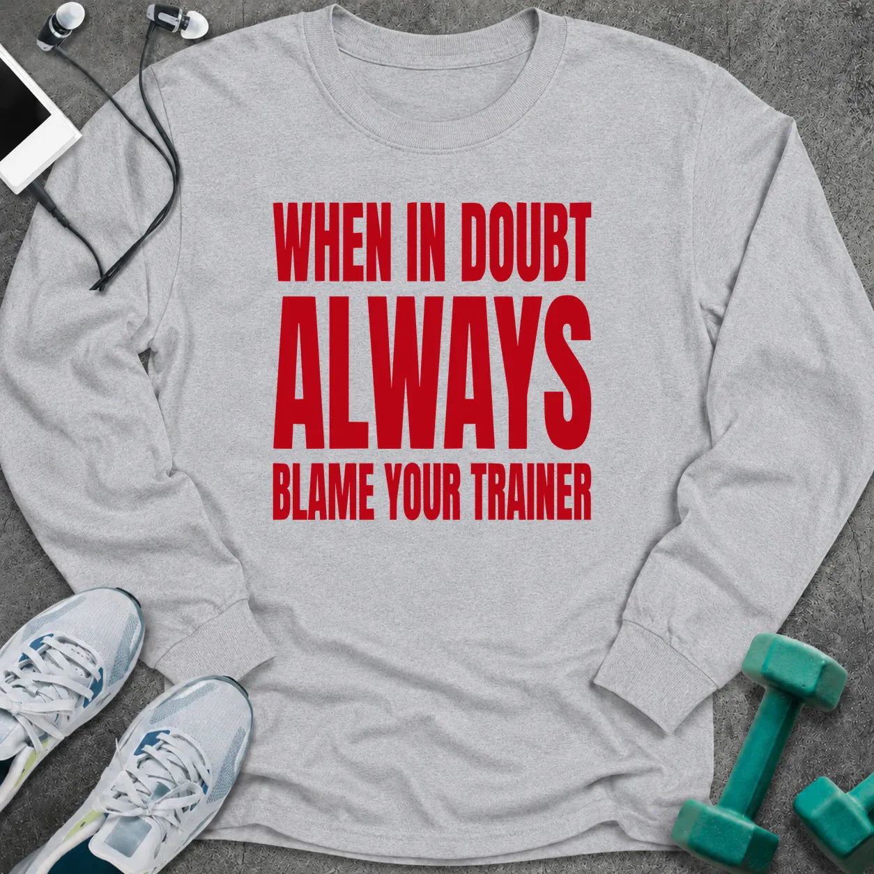 Ash long sleeve tee printed with "When In Doubt Always Blame Your Trainer" in red