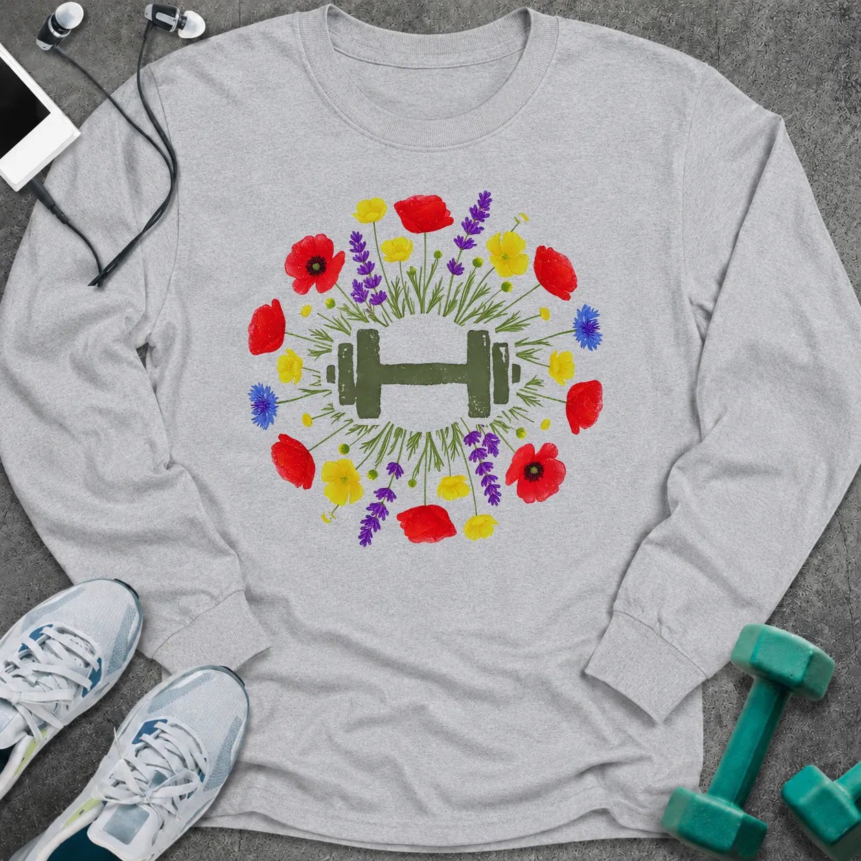 Ash long sleeve tee printed with a wreath of red and purple wildflowers around a green dumbbell