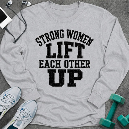 Ash long sleeve tee printed with "Strong Women Lift Each Other Up" in black distressed varsity lettering
