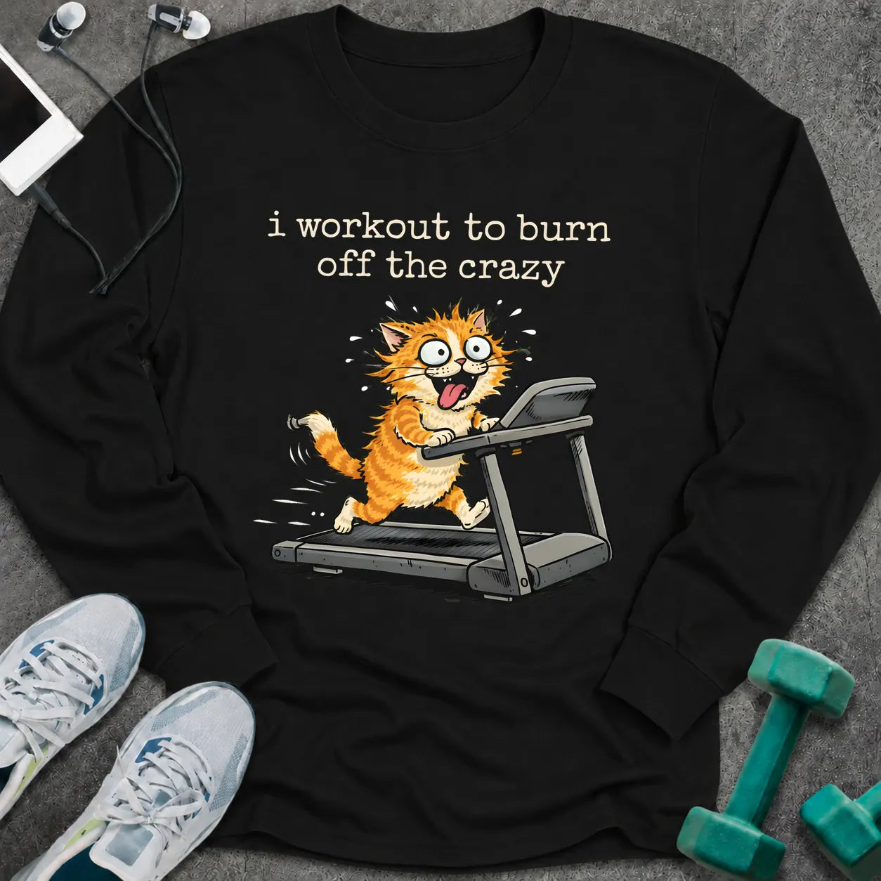 Black long sleeve tee printed with "i workout to burn off the crazy" in white, with a wild-eyed cartoon cat running on a treadmill