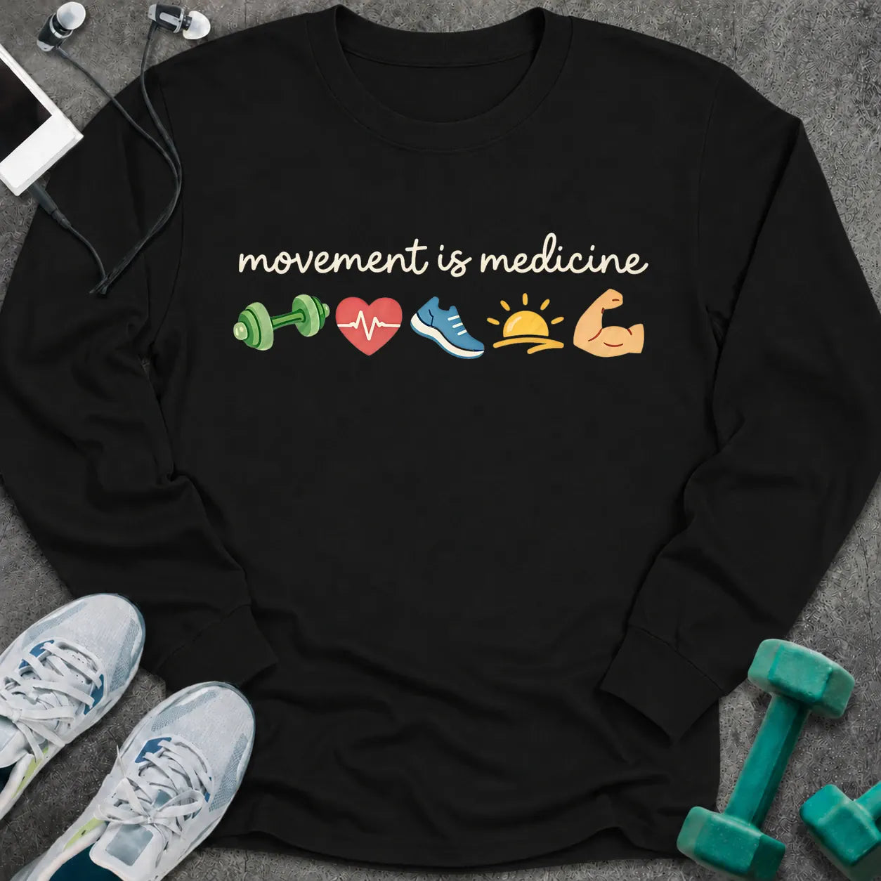 Black long sleeve tee printed with "movement is medicine" in white script, with dumbbell, heart, running shoe, sunrise and flexed arm icons