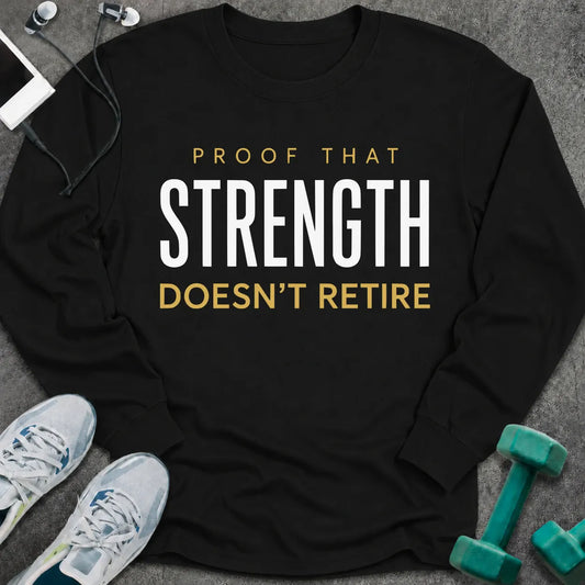 Black long sleeve tee printed with "Proof That Strength Doesn't Retire" in white and gold