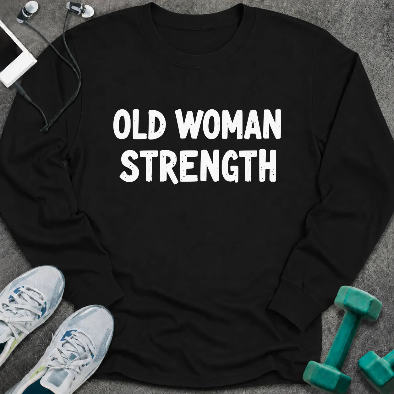 Black long sleeve tee printed with "Old Woman Strength" in white
