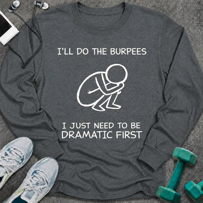 Dark heather long sleeve tee printed with "I'll Do The Burpees, I Just Need To Be Dramatic First" in white, with a line drawing of a figure slumped on the floor