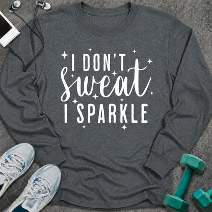 Dark heather long sleeve tee printed with "I Don't Sweat I Sparkle" in white script, with sparkle stars