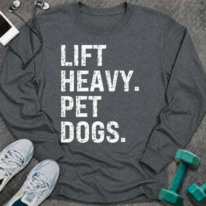 Dark heather long sleeve tee printed with "Lift Heavy. Pet Dogs." in white distressed lettering