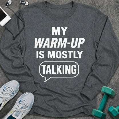 Dark heather long sleeve tee printed with "My Warm-Up Is Mostly Talking" in white, with a speech bubble around the last word
