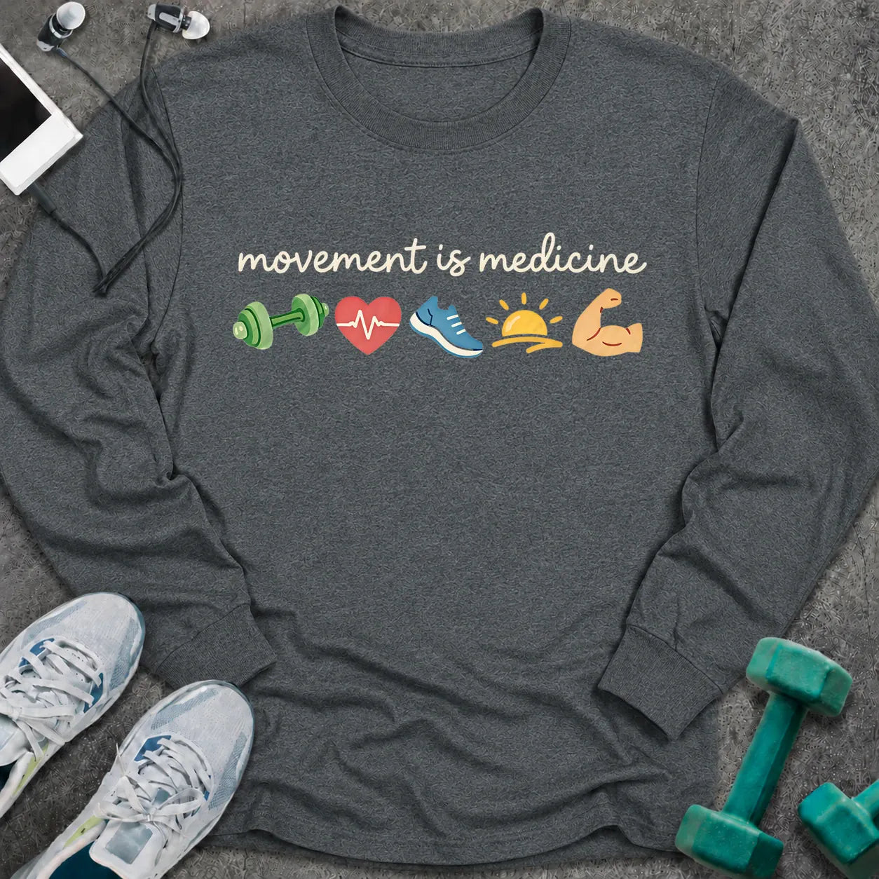 Dark heather long sleeve tee printed with "movement is medicine" in white script, with dumbbell, heart, running shoe, sunrise and flexed arm icons