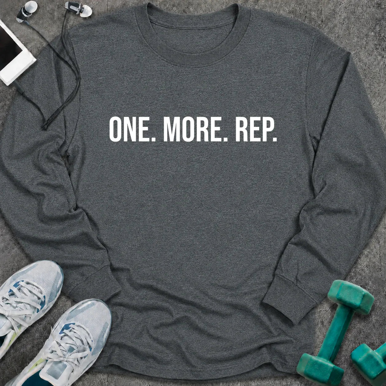 Dark heather long sleeve tee printed with "One. More. Rep." in white
