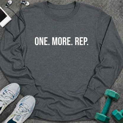 Dark heather long sleeve tee printed with "One. More. Rep." in white