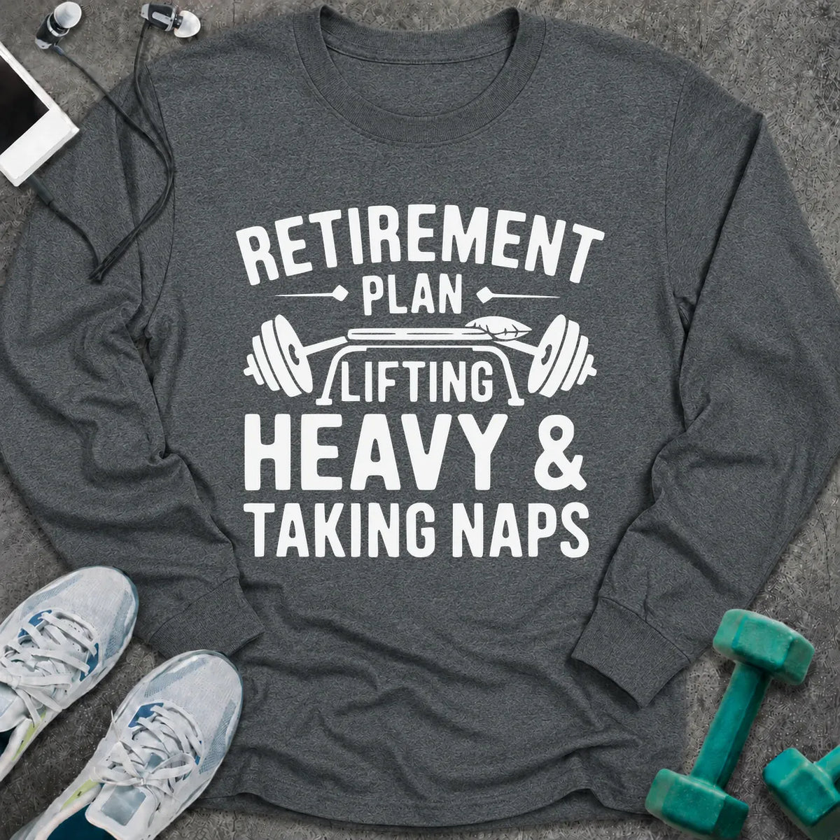 Dark heather long sleeve tee printed with "Retirement Plan: Lifting Heavy & Taking Naps" in white, with a barbell