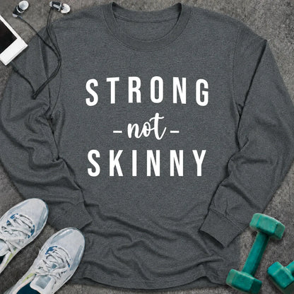 Dark heather long sleeve tee printed with "Strong Not Skinny" in white