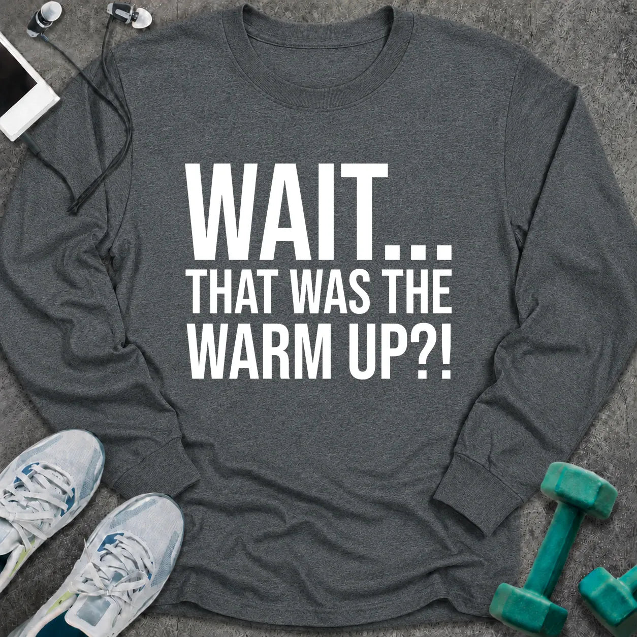 Dark heather long sleeve tee printed with "Wait... That Was The Warm Up?!" in white