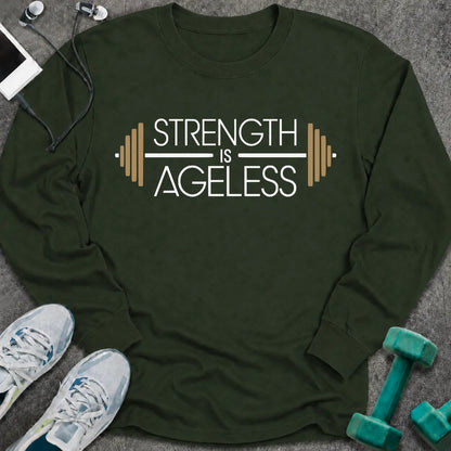 Forest green long sleeve tee printed with "Strength is Ageless" in white and gold, with a barbell framing the words