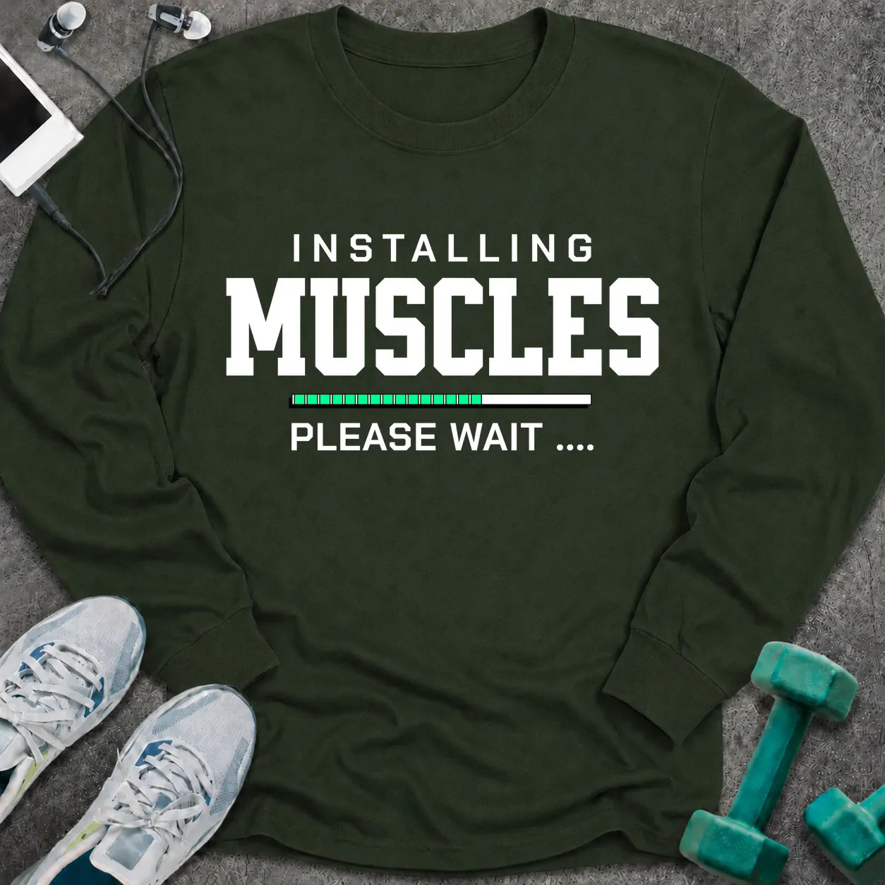 Forest green long sleeve tee printed with "Installing Muscles Please Wait" in white, with a green loading bar