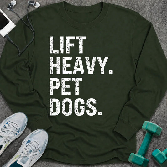 Forest green long sleeve tee printed with "Lift Heavy. Pet Dogs." in white distressed lettering