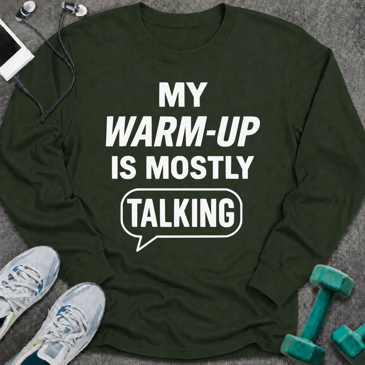 Forest green long sleeve tee printed with "My Warm-Up Is Mostly Talking" in white, with a speech bubble around the last word