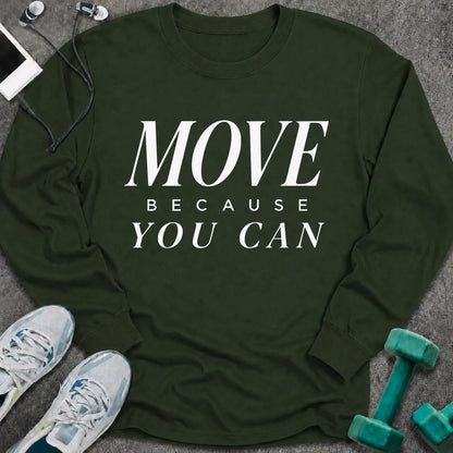 Forest green long sleeve tee printed with "Move Because You Can" in white serif lettering