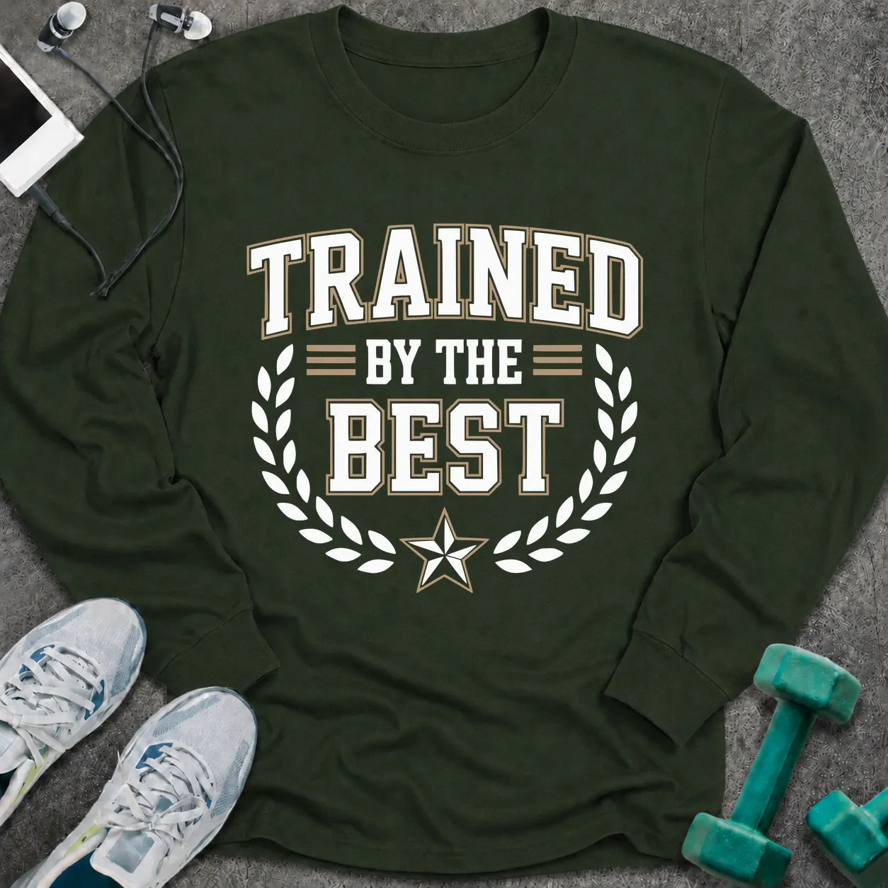 Forest green long sleeve tee printed with "Trained By The Best" in white, with a laurel wreath and star