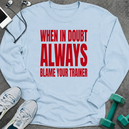 Light blue long sleeve tee printed with "When In Doubt Always Blame Your Trainer" in red