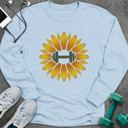 Light blue long sleeve tee printed with a sunflower with a green dumbbell at its center