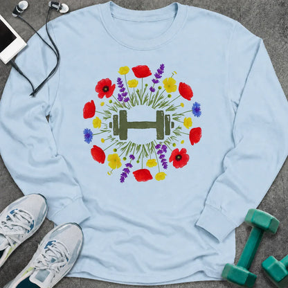 Light blue long sleeve tee printed with a wreath of red and purple wildflowers around a green dumbbell