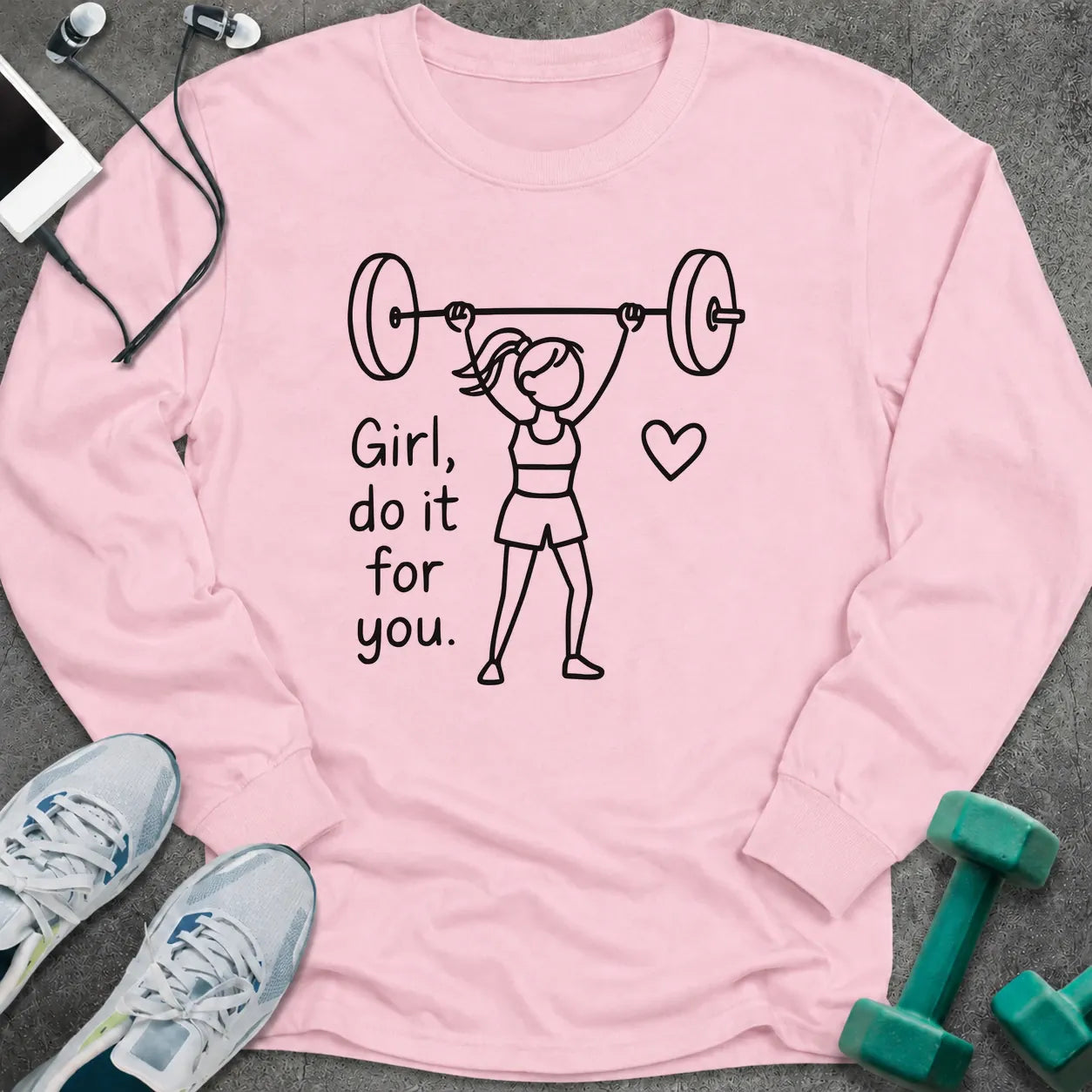 Light pink long sleeve tee printed with "Girl, do it for you." in black line art, with a woman pressing a barbell and a small heart