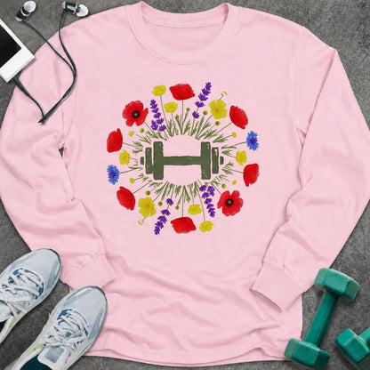Light pink long sleeve tee printed with a wreath of red and purple wildflowers around a green dumbbell