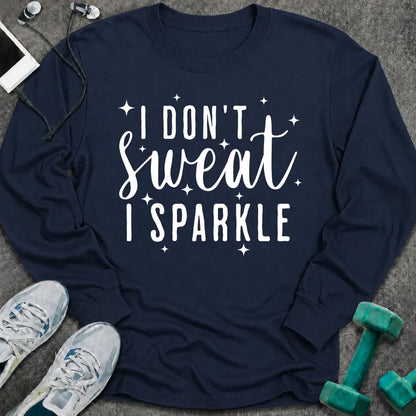 Navy long sleeve tee printed with "I Don't Sweat I Sparkle" in white script, with sparkle stars