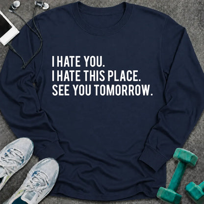 Navy long sleeve tee printed with "I Hate You. I Hate This Place. See You Tomorrow." in white