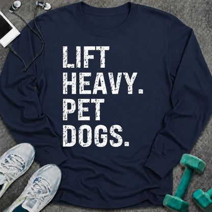 Navy long sleeve tee printed with "Lift Heavy. Pet Dogs." in white distressed lettering