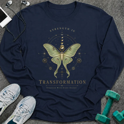 Navy long sleeve tee printed with "Strength Is Transformation" in gold, with a luna moth beneath a row of moon phases