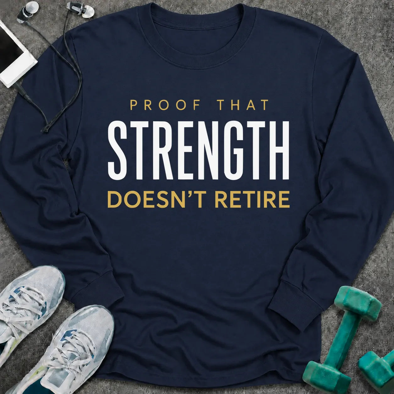 Navy long sleeve tee printed with "Proof That Strength Doesn't Retire" in white and gold