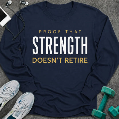 Navy long sleeve tee printed with "Proof That Strength Doesn't Retire" in white and gold