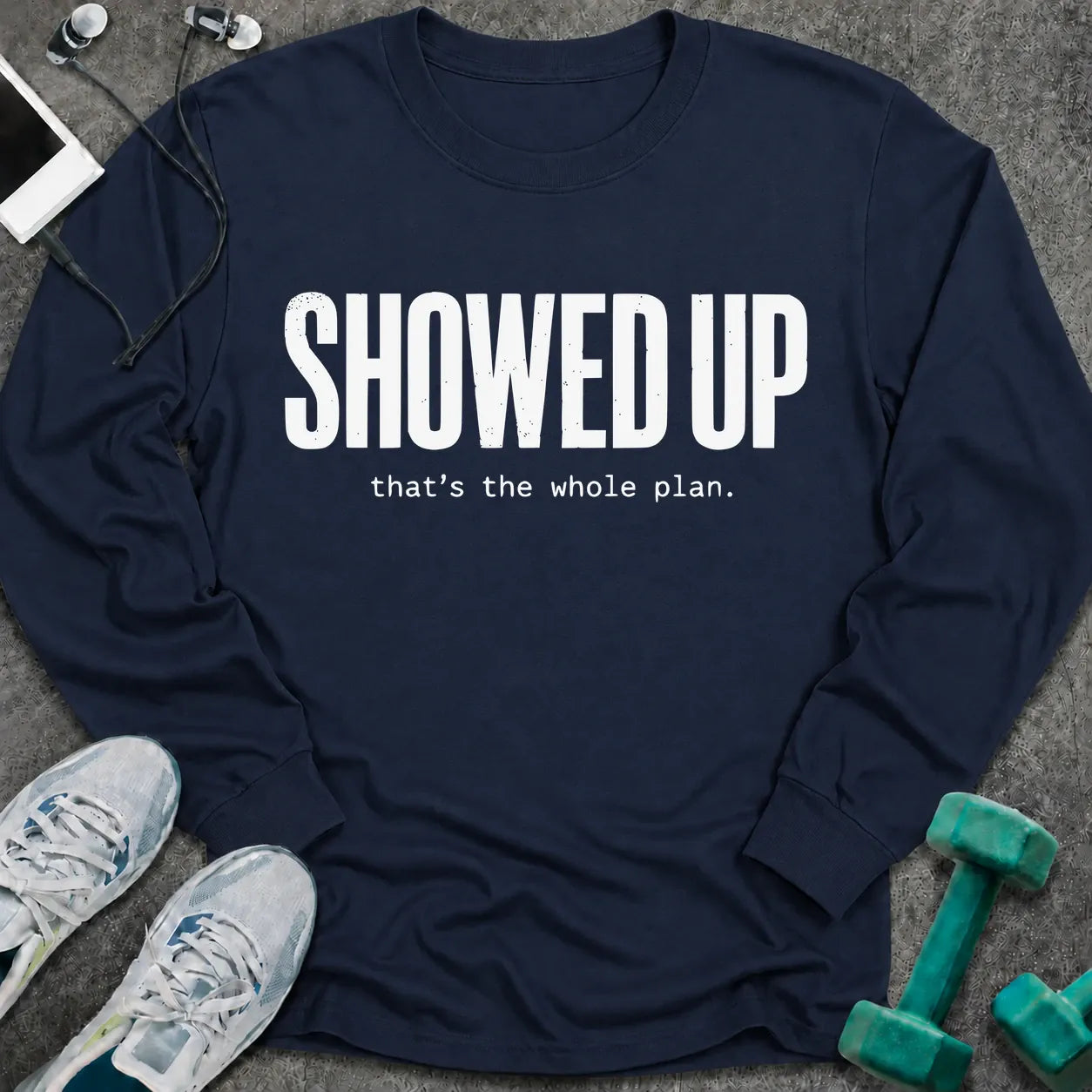 Navy long sleeve tee printed with "Showed Up. that's the whole plan." in white