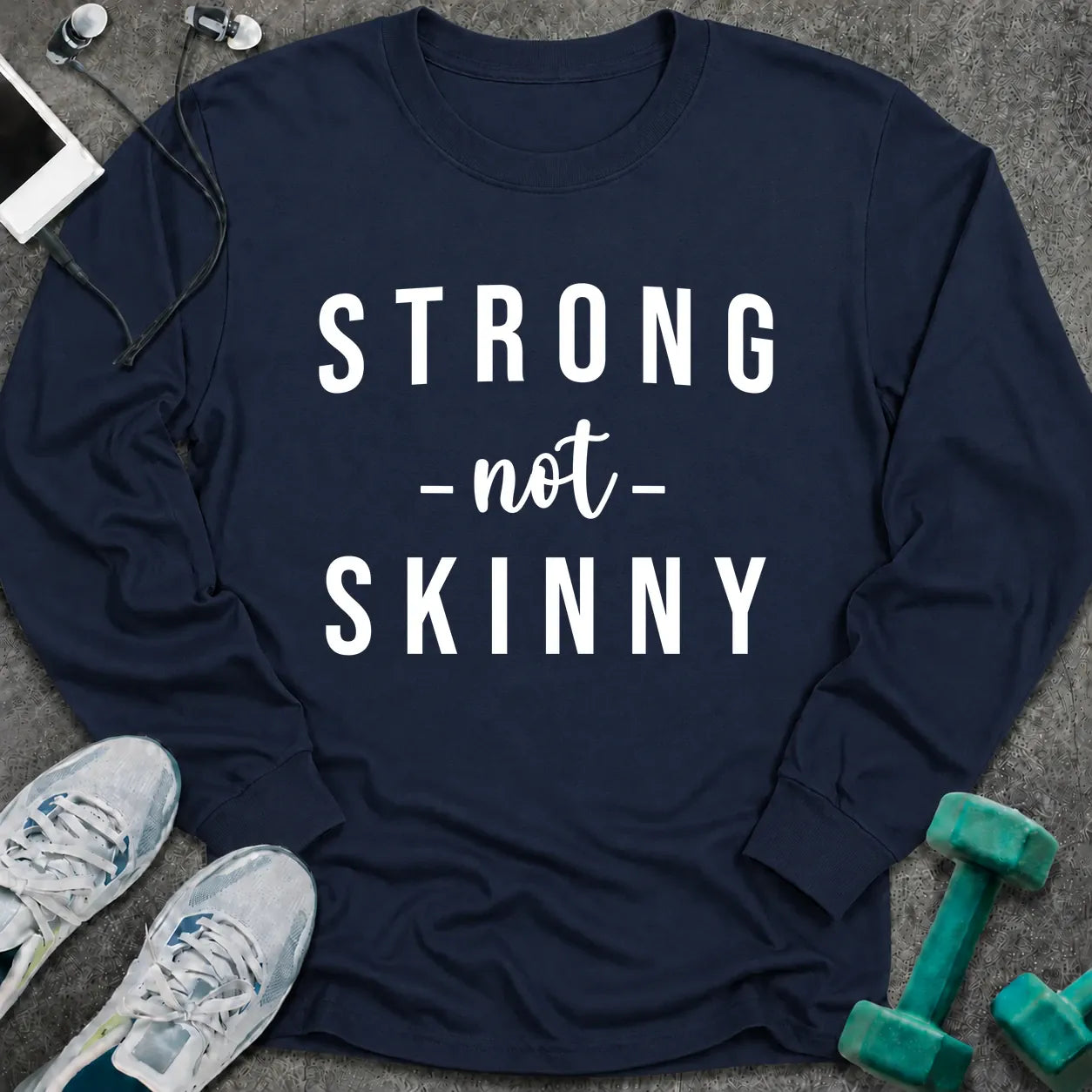 Navy long sleeve tee printed with "Strong Not Skinny" in white