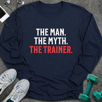 Navy long sleeve tee printed with "The Man. The Myth. The Trainer." in white and coral