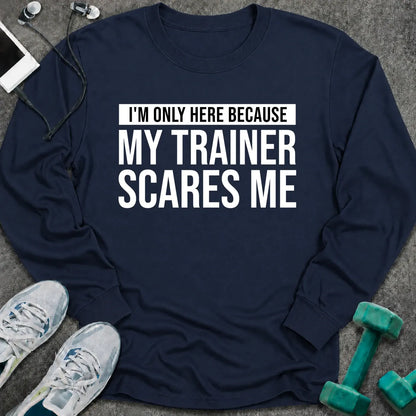 Navy long sleeve tee printed with "I'm Only Here Because My Trainer Scares Me" in white with a black highlight bar
