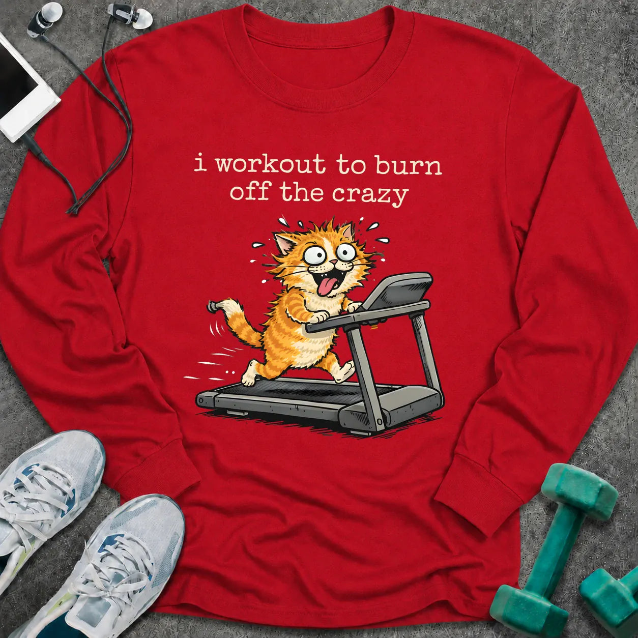 Red long sleeve tee printed with "i workout to burn off the crazy" in white, with a wild-eyed cartoon cat running on a treadmill