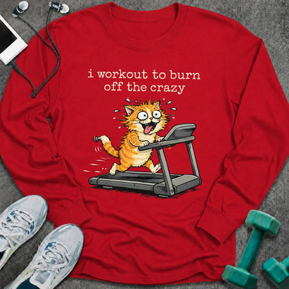 Red long sleeve tee printed with "i workout to burn off the crazy" in white, with a wild-eyed cartoon cat running on a treadmill