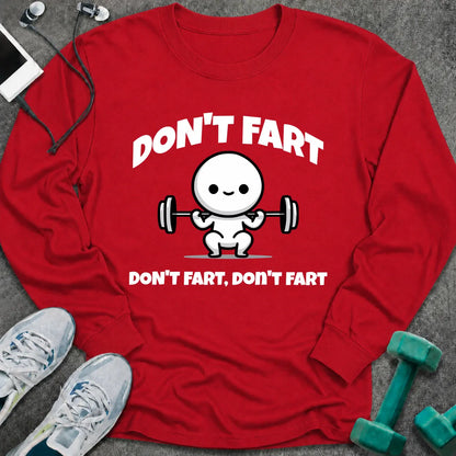 Red long sleeve tee printed with "Don't Fart, Don't Fart, Don't Fart" in white, with a cartoon figure straining under a barbell